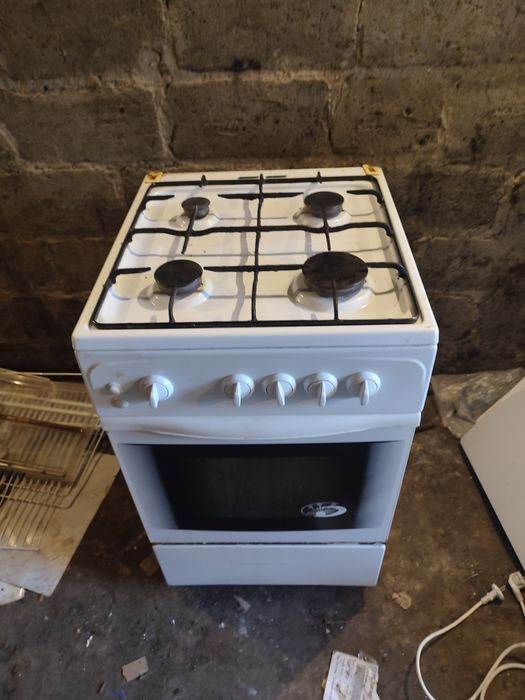 Газовая плита с електроподжегом