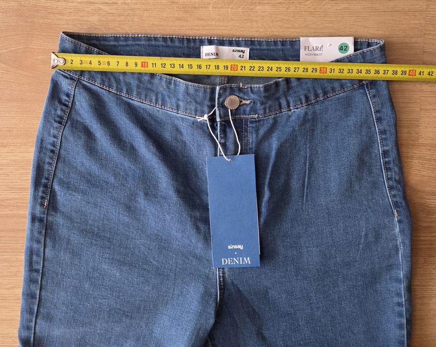 Nowe dżinsy dzwony Sinsay L/XL
