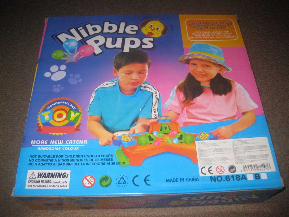 Brinquedo "Nibble Pups" Novo e Embalado!