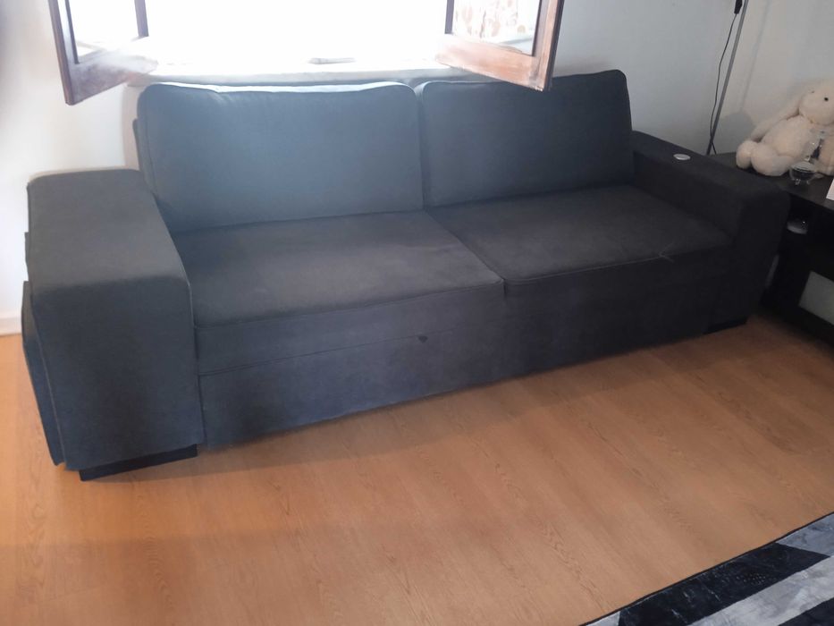Sofá cama cinzento