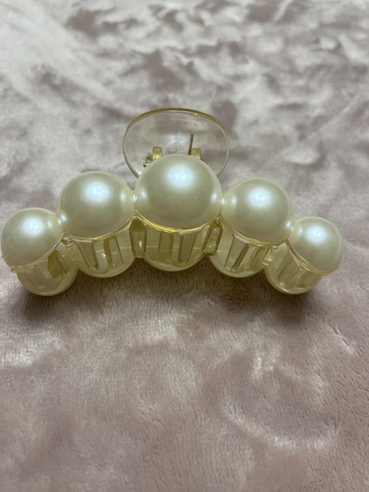 Mola cabelo com pérolas