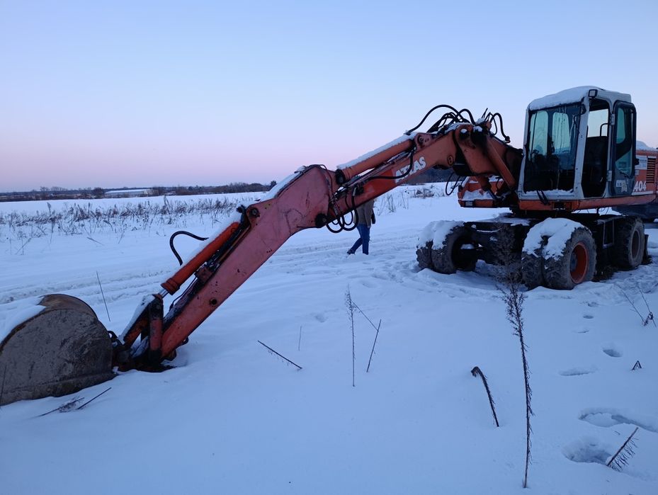 Екскаватор атлас 1404