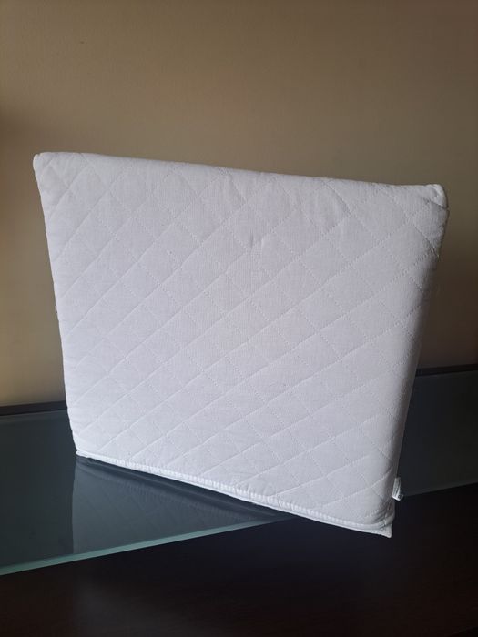 Almofada encosto triangular