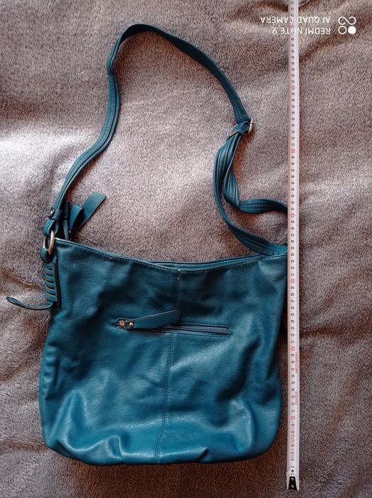 Torebka turkusowa z wieloma skrytkami