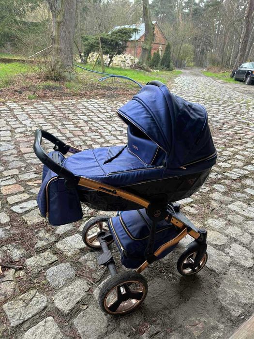 Wózek dziecięcy Junama dla dwójki dzieci w kolorze niebieskim