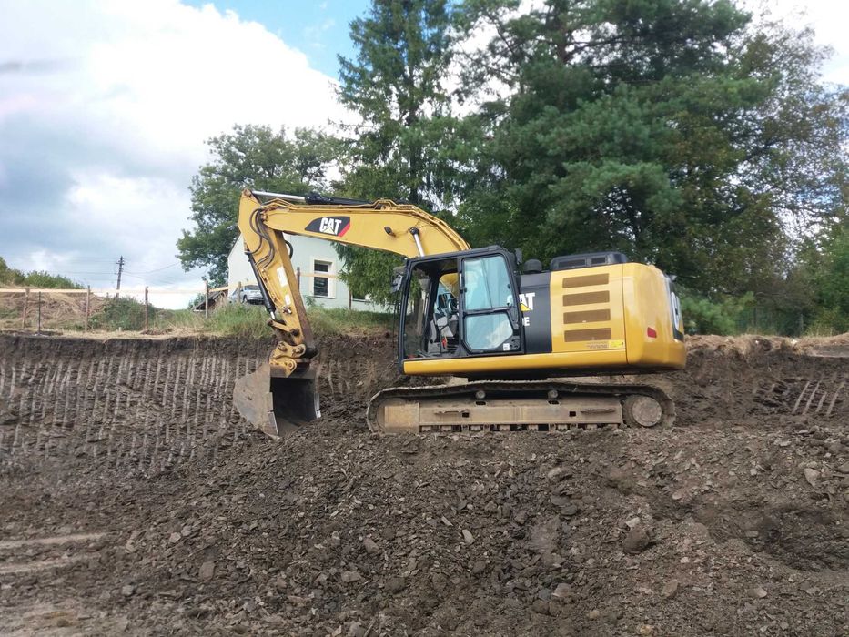 usługi koparką , wyburzenia , prace ziemne niwelacja