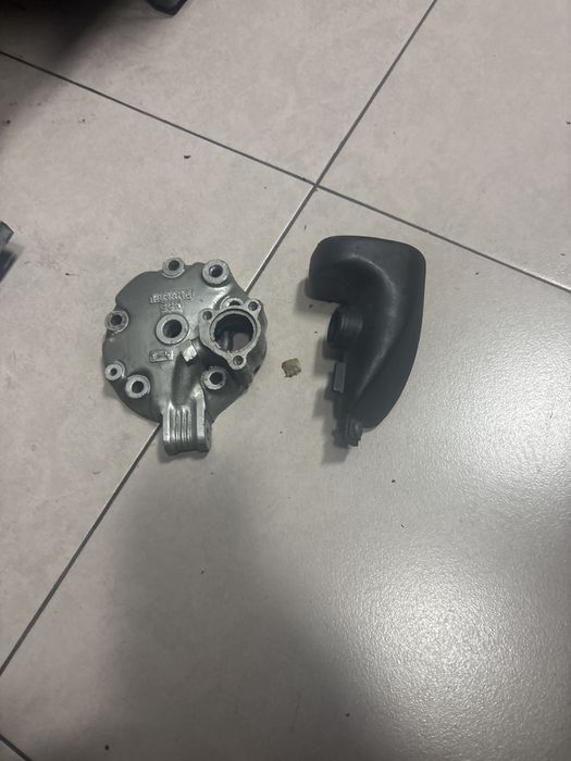 Válvula escape e Tampa Embraiagem DTR 125