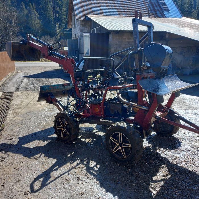 Міні екскаватор.