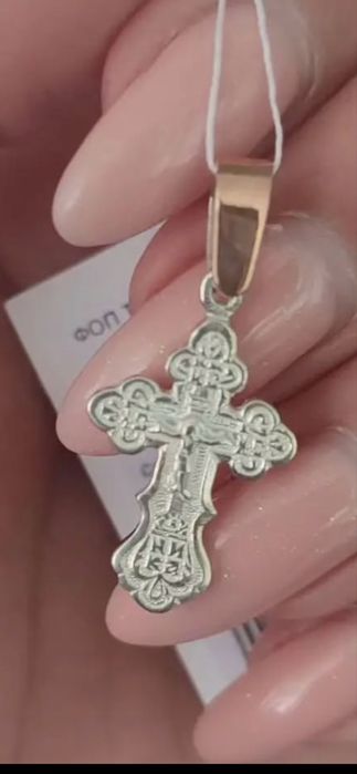 Срібний хрестик дитячий із шнурочком