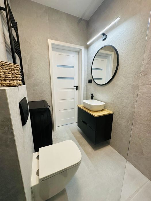 Nowe dwupoziomowe mieszkanie   z patio i ogrodem