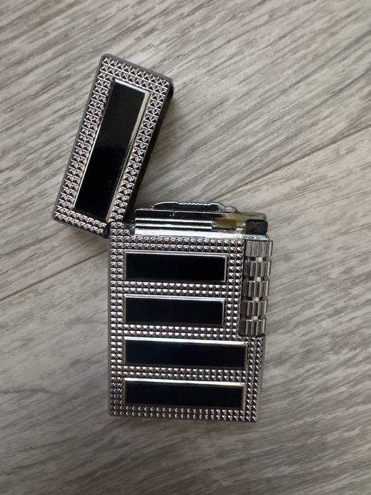 зажигалка с фирменым щелчком