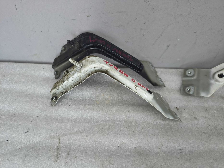 Wspornik mocowanie błotnika lewe przód VW Touran II 1T3 1T0821135C