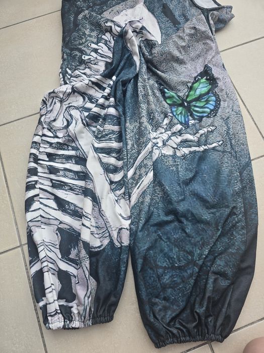 Ogrodniczki kościotrup i motyl