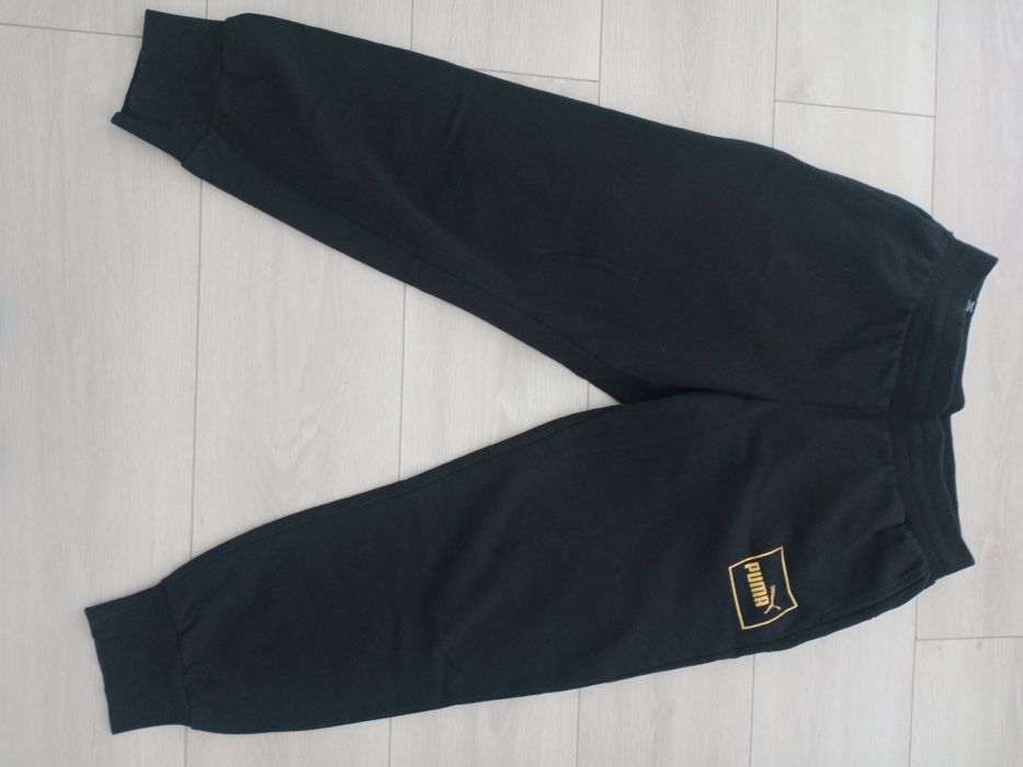 Spodnie PUMA złote napisy r. M