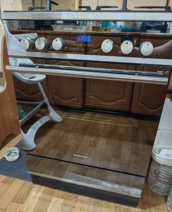 Продам газовую плиту с электро духовкой