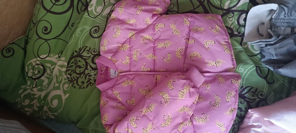 Куртки на дівчинку 110-116