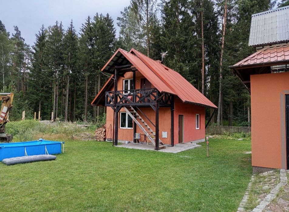 Wynajem tanie noclegi . Domek przy lesie na Mazurach