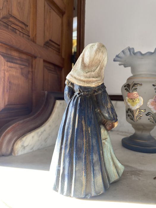 Estatueta mae e filho