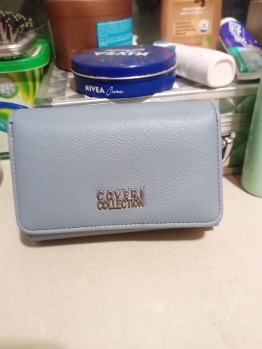 Potfel marki coveri collection