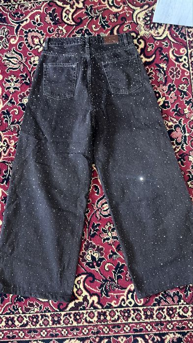 Джинси в камінці