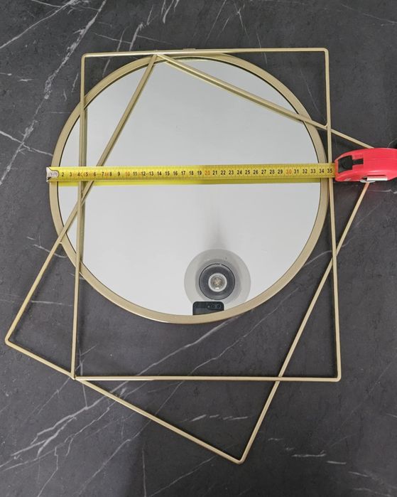 Designerskie lustro naścienne