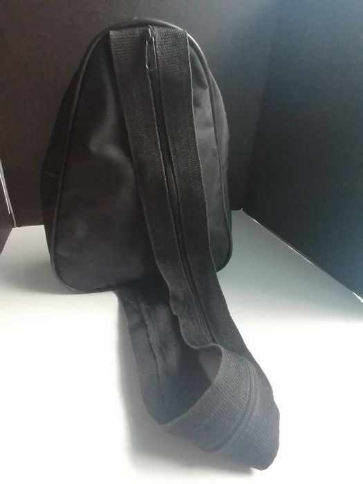Mochila com publicidade à Coca-Cola