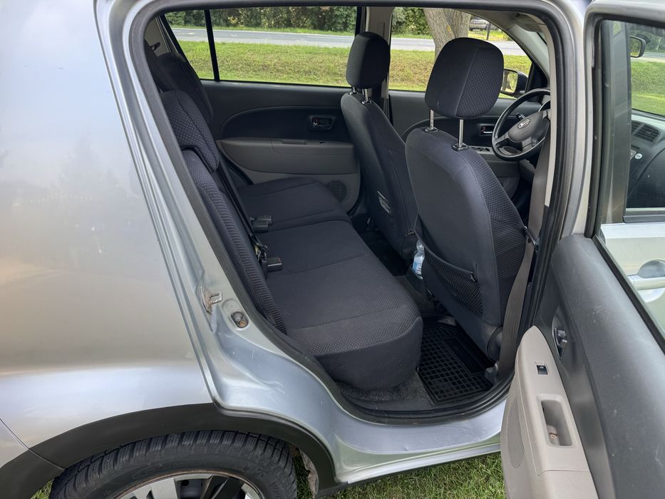 Daihatsu Sirion 1.3b 4x4 2006r klima 5 drzwi hak