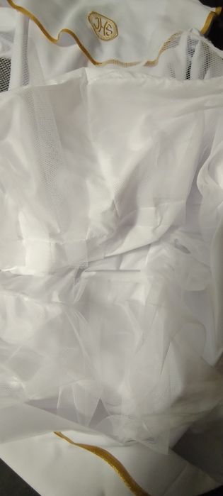 Alba komunijna na uroczystość przyjęcia I Komunii Świętej