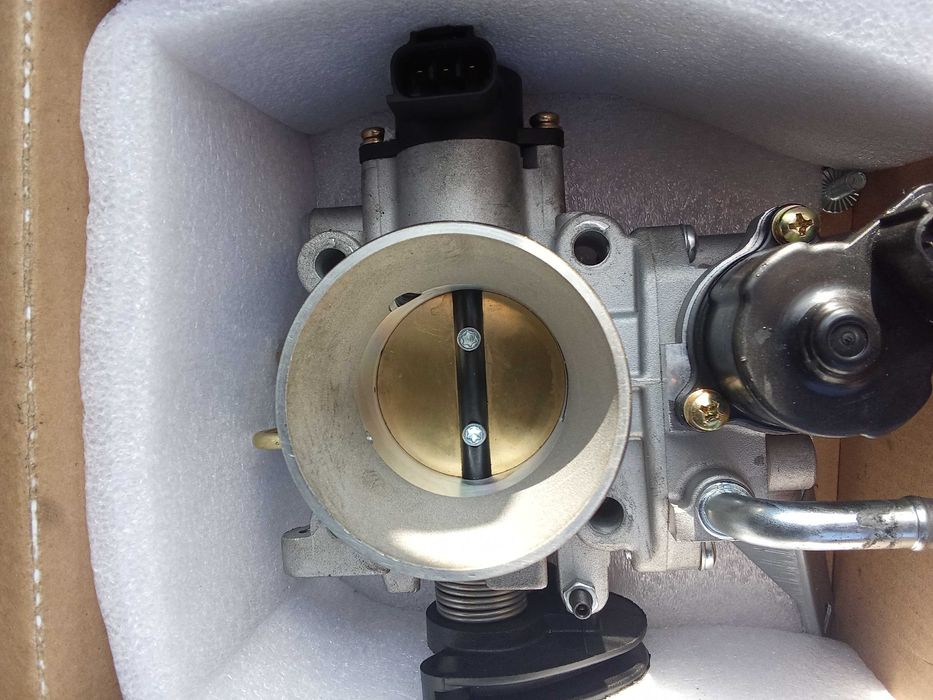 Дроссель Митсубиси Лансер 9