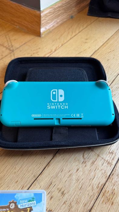 Nintendo Switch Lite Turkusowa + Minecraft, Animal Crossing, Etui