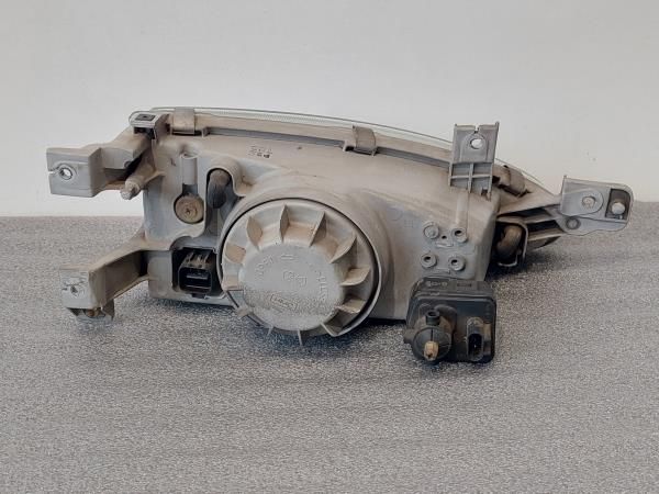 Ótica / farol esquerda HYUNDAI Accent I Sedan (X3)