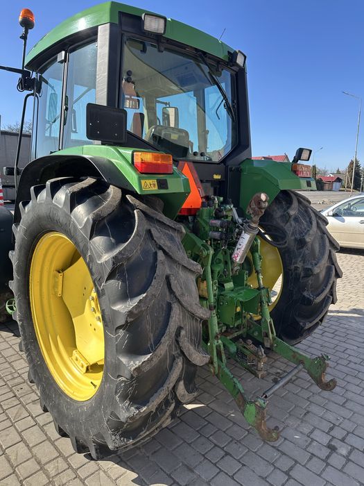 Трактор John Deere 6400