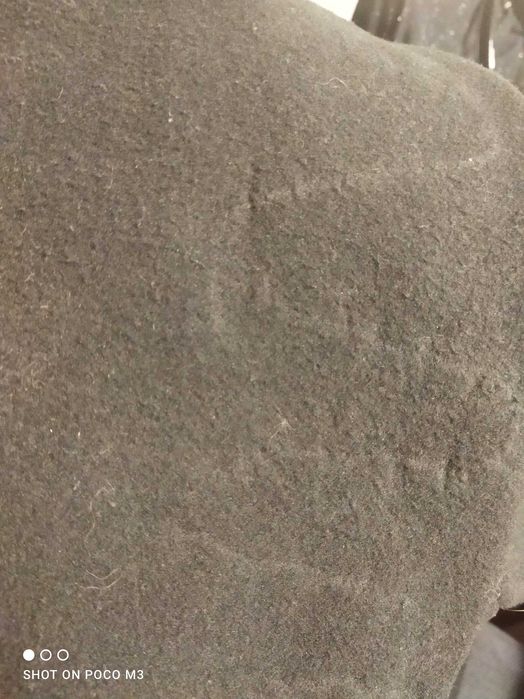 Ocieplany płaszcz flauszowy .