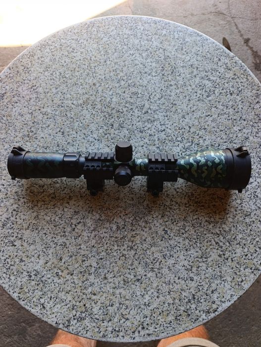 Mira telescópica diurna Bushnell Red dot