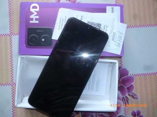 телефон HMD  ARC  андроід 14