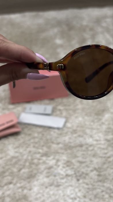 Oculos de sol da MiuMiu
