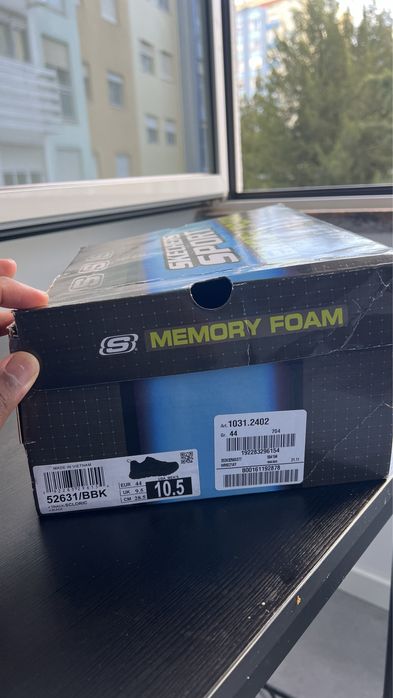 Sapatilha preta de Skechers