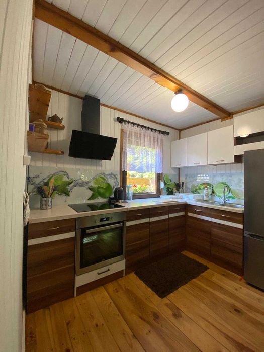Domek nad jeziorem Łąkie jacuzzi sauna prywatny pomost