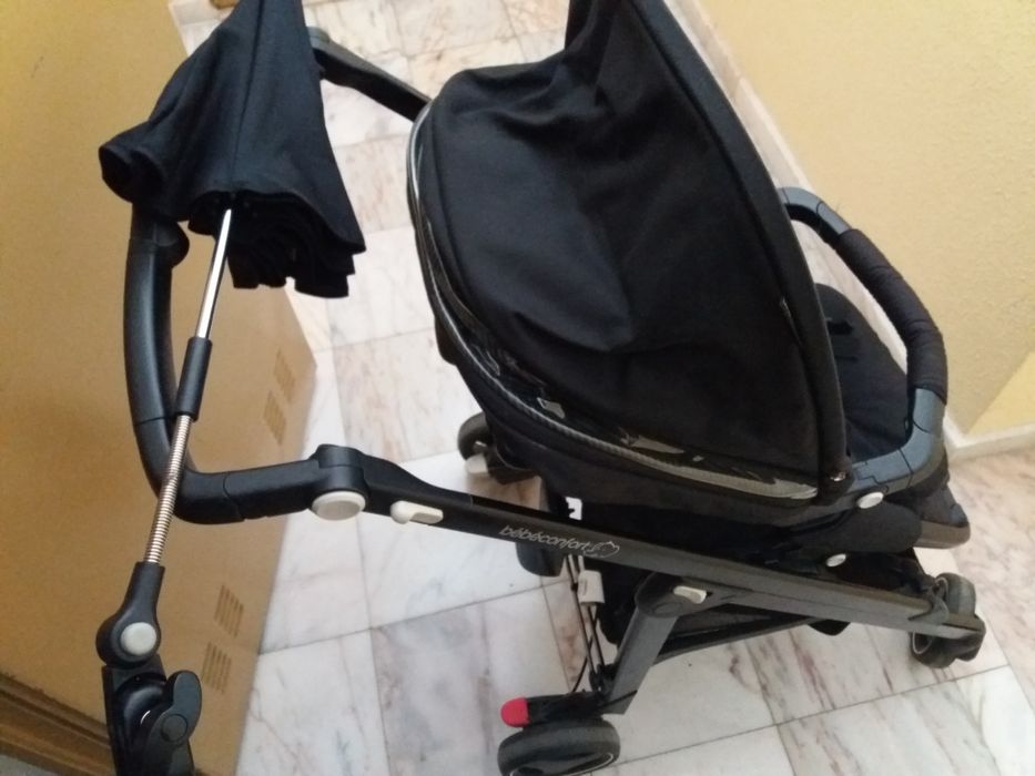 Carrinho bebé bebeconfort bem estimado com chapéu protecção solar