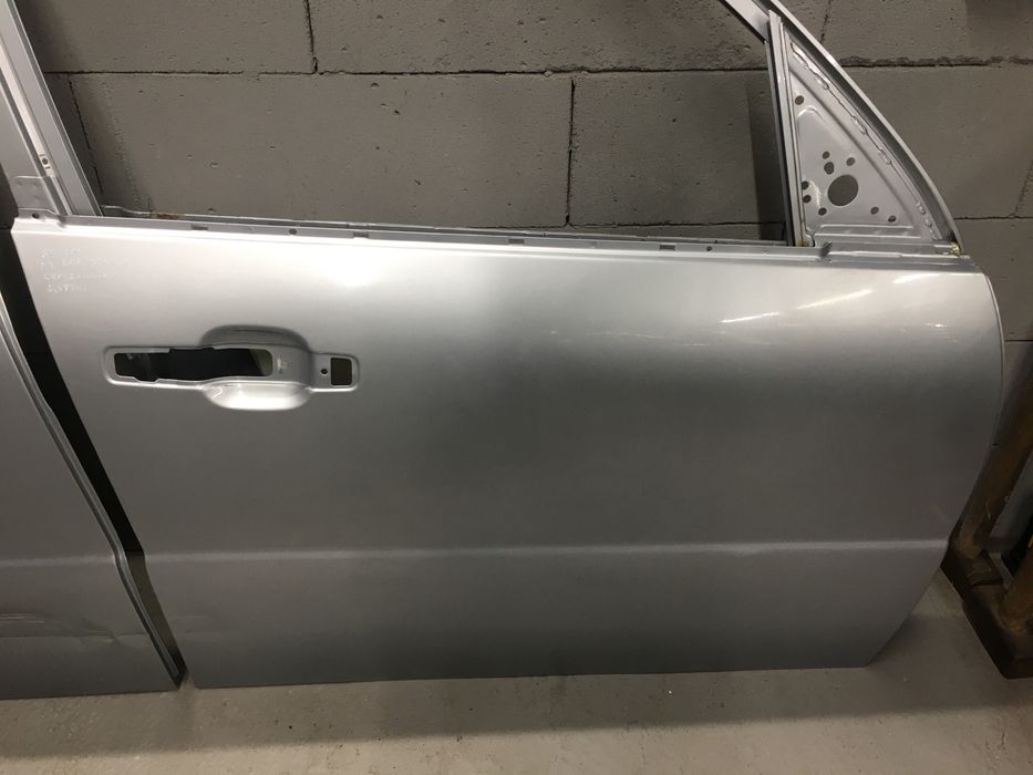 Дверь передняя задняя левая правая Ssang Yong Rexton Рекстон запчасти