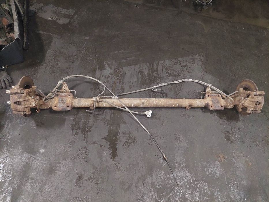 OŚ BELKA ZAWIESZENIA TYŁ + RESORY + KOŁA OPEL MOVANO A NA PRZYCZEPKĘ