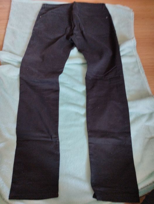 Spodnie dżinsy,czarne,dziury r.32