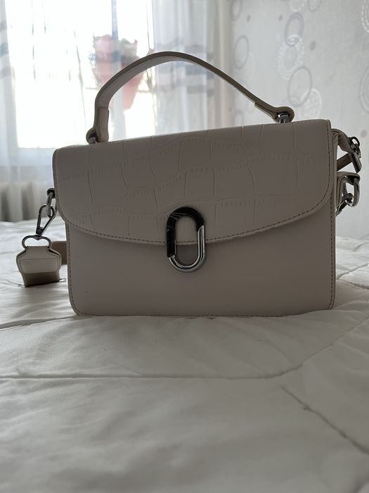 Сумка клатч в молочному кольорі