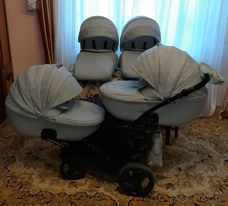 Універсальна коляска для двійнят Tako