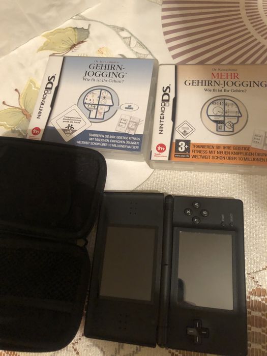Konsola Nintendo DS Lite + 2 gry (Dr Kawashima's Gehirn-Jogging) + etui