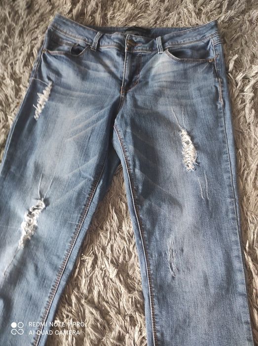 Spodnie dżinsowe " porwane"
