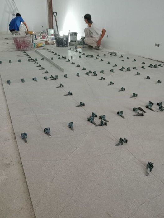 Ladrilhadores ,equipa de quatro ladrilhador