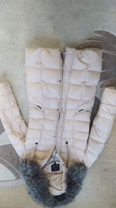 Пухова куртка жіноча