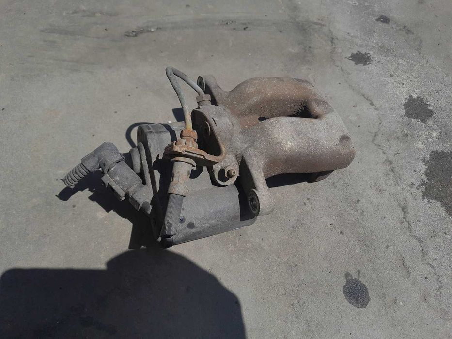 Passat B6 2.0 TDI - zacisk hamulcowy prawy tył