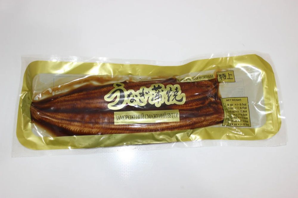 Угорь копченый унаги. Угорь копченый. Угорь копченый нарезка. Угорь копченый в соусе унаги. Угорь копченый унаги.